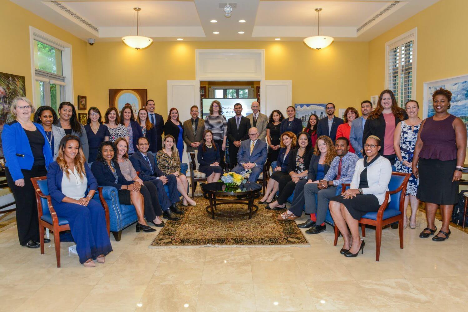 A group photo of cohort #4 of the President's leadership program inside the Ronald W. Reagan Presidential House